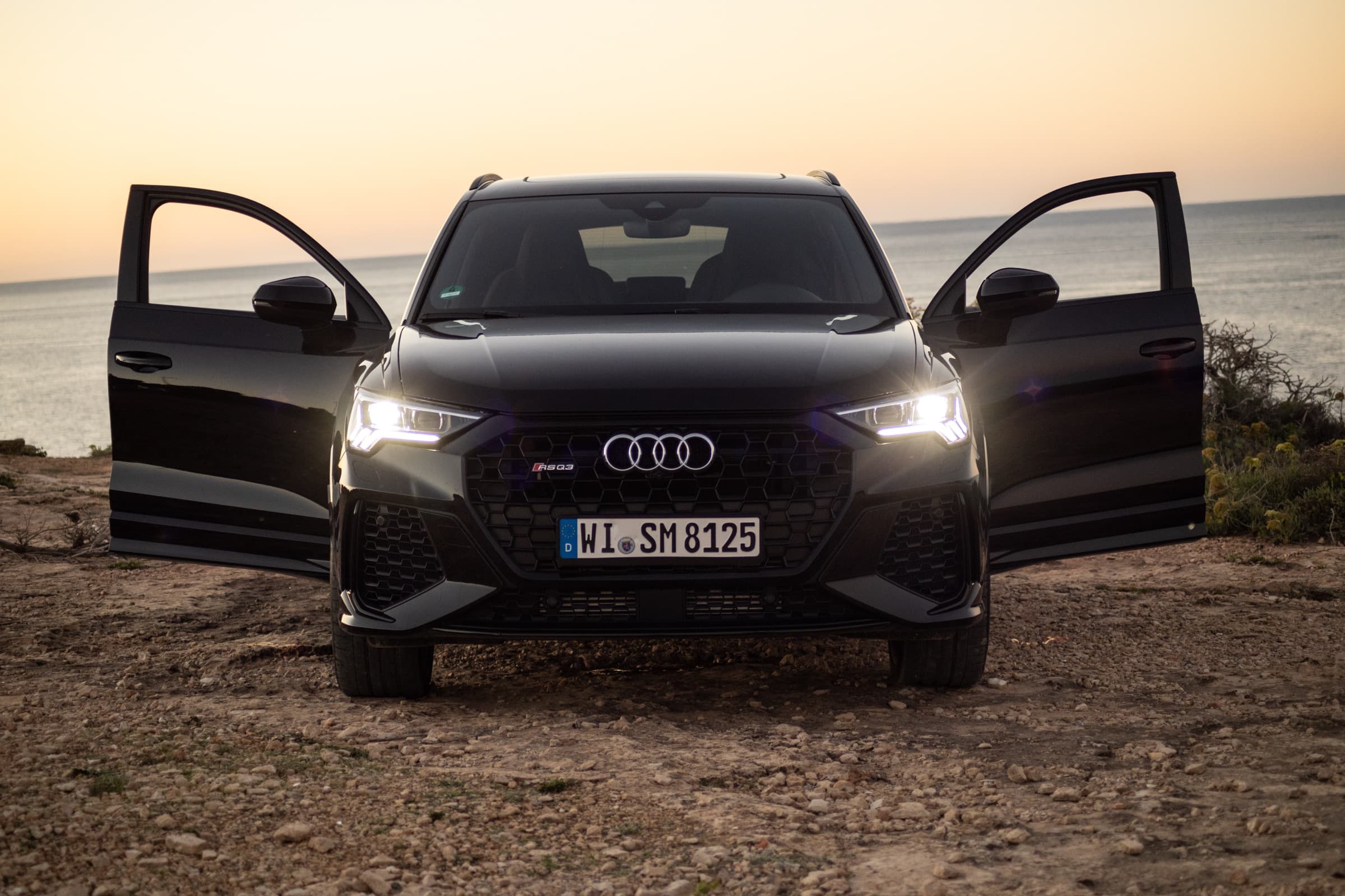 Luxury car on Ibiza coast road