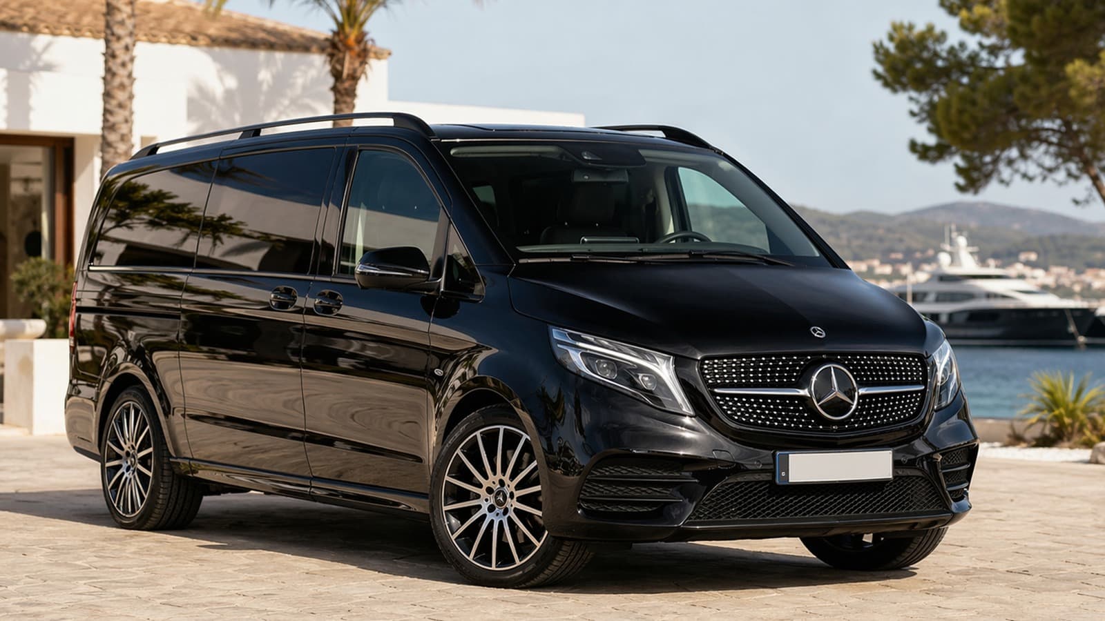 Black premium people carrier outside an Ibiza villa